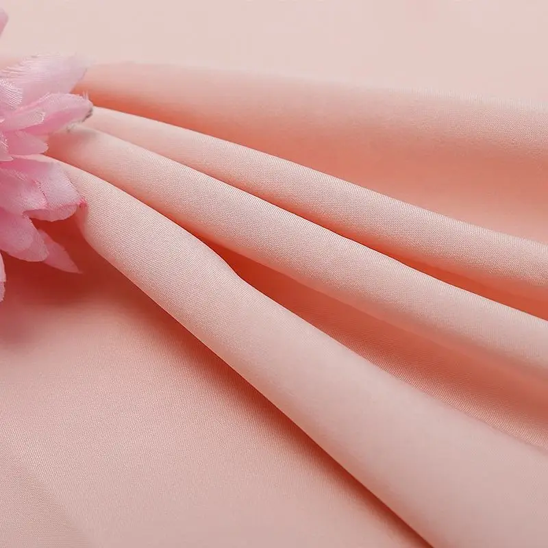 Shaoxing yuyuan imp nslycra wholesale custom high quality woven plain sports pants fabric rolls nslycra four way stretch fabric