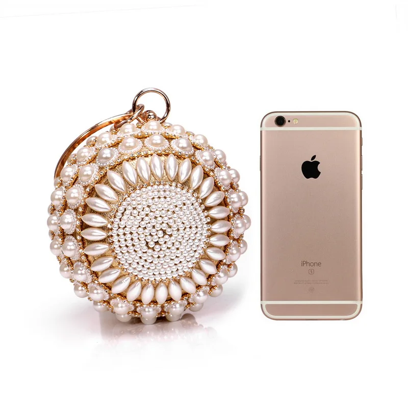 The new ball design with rhinestone paste is suitable for large banquet party hand bag clutch bag evening metal bag