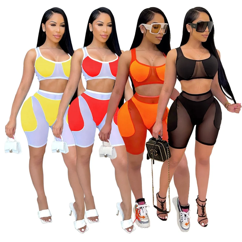 
KX-TS1140 Best selling club wear solid hollow out mesh shorts set patchwork crop top two piece shorts set women 