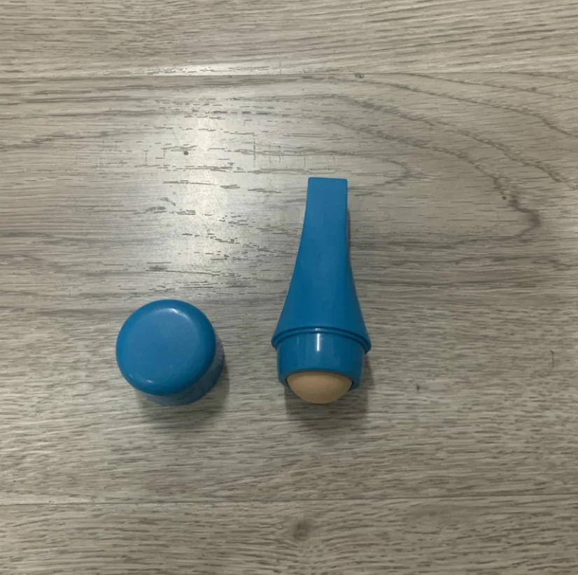 Hot selling high quality natural volcanic stone oil absorption roller facial massage clean skin care tool