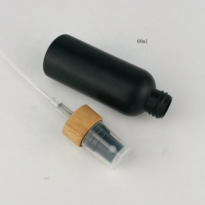 60 ml matte black bottles 2 ounce plastic HDPE bottle with bamboo closures for cosmetic packaging