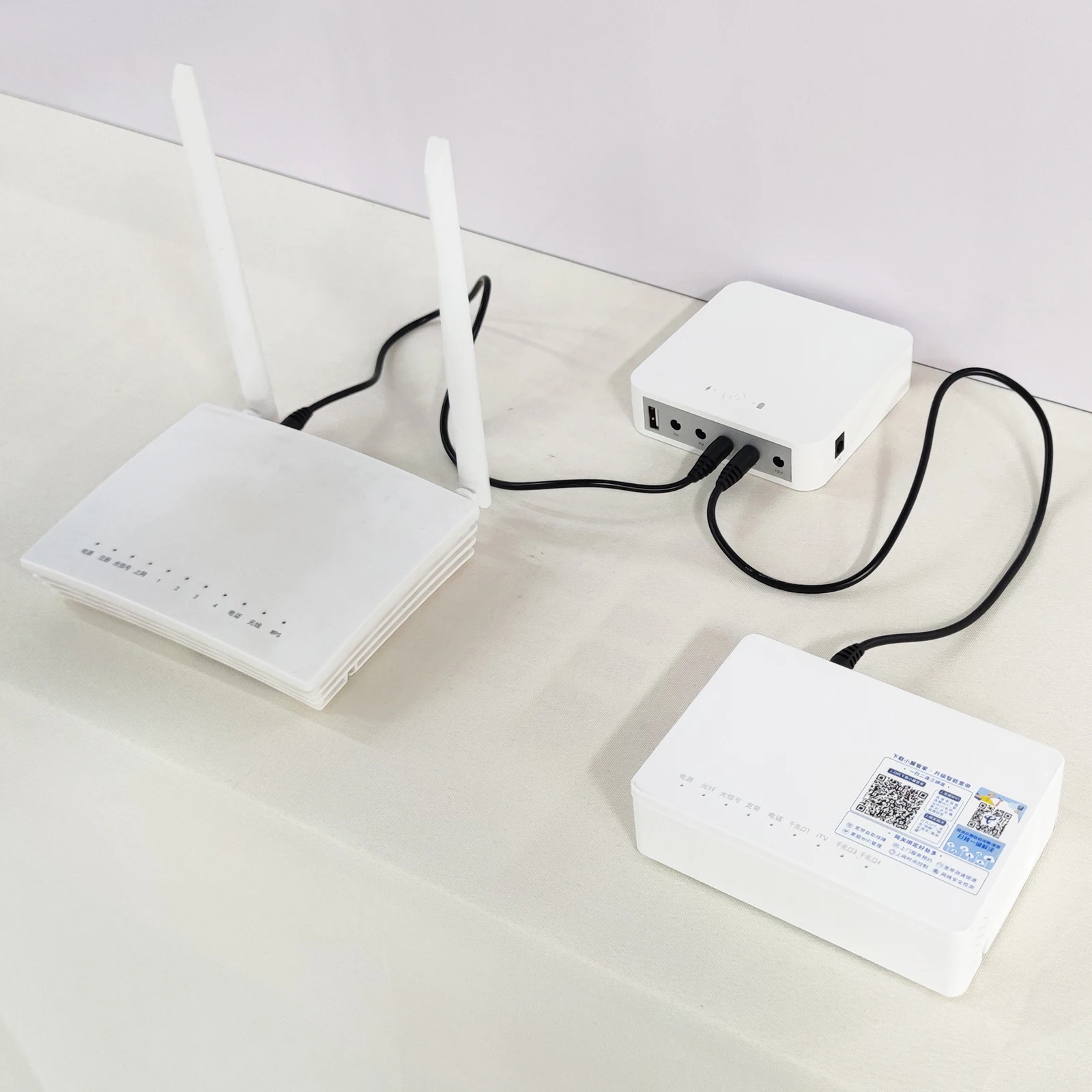 wholesale manufacture 5V9V12V19V12V WGP mini ups for wifi router  ups power supply mini ups