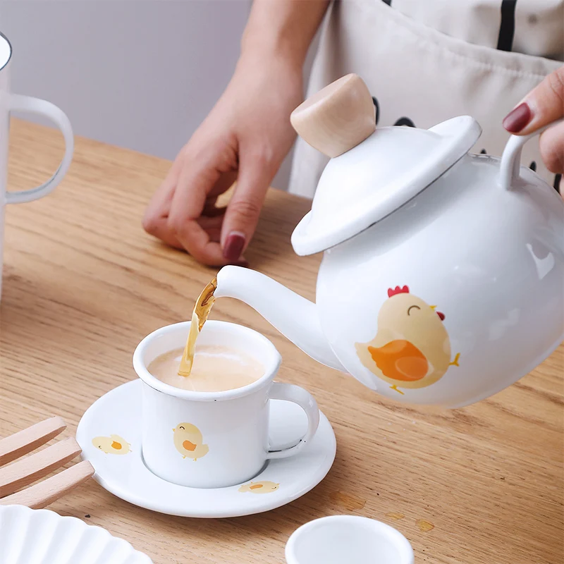 A tea sets is one teapot and four mugs enamel tea and coffee sets