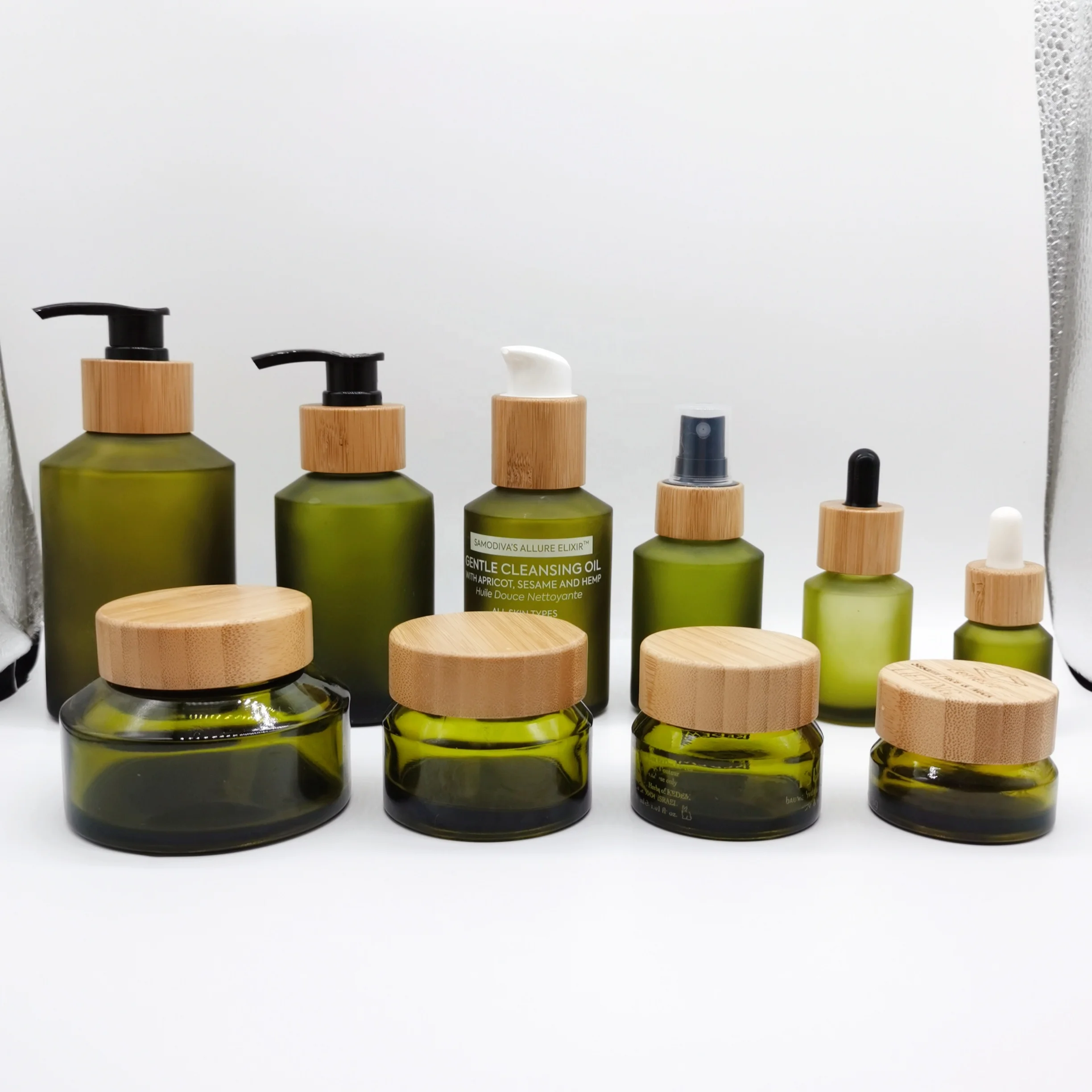 Cosmetic set bottle and jar series cosmetic olive slant shoulder glass bottle and jar with bamboo lid/dropper/pump set products