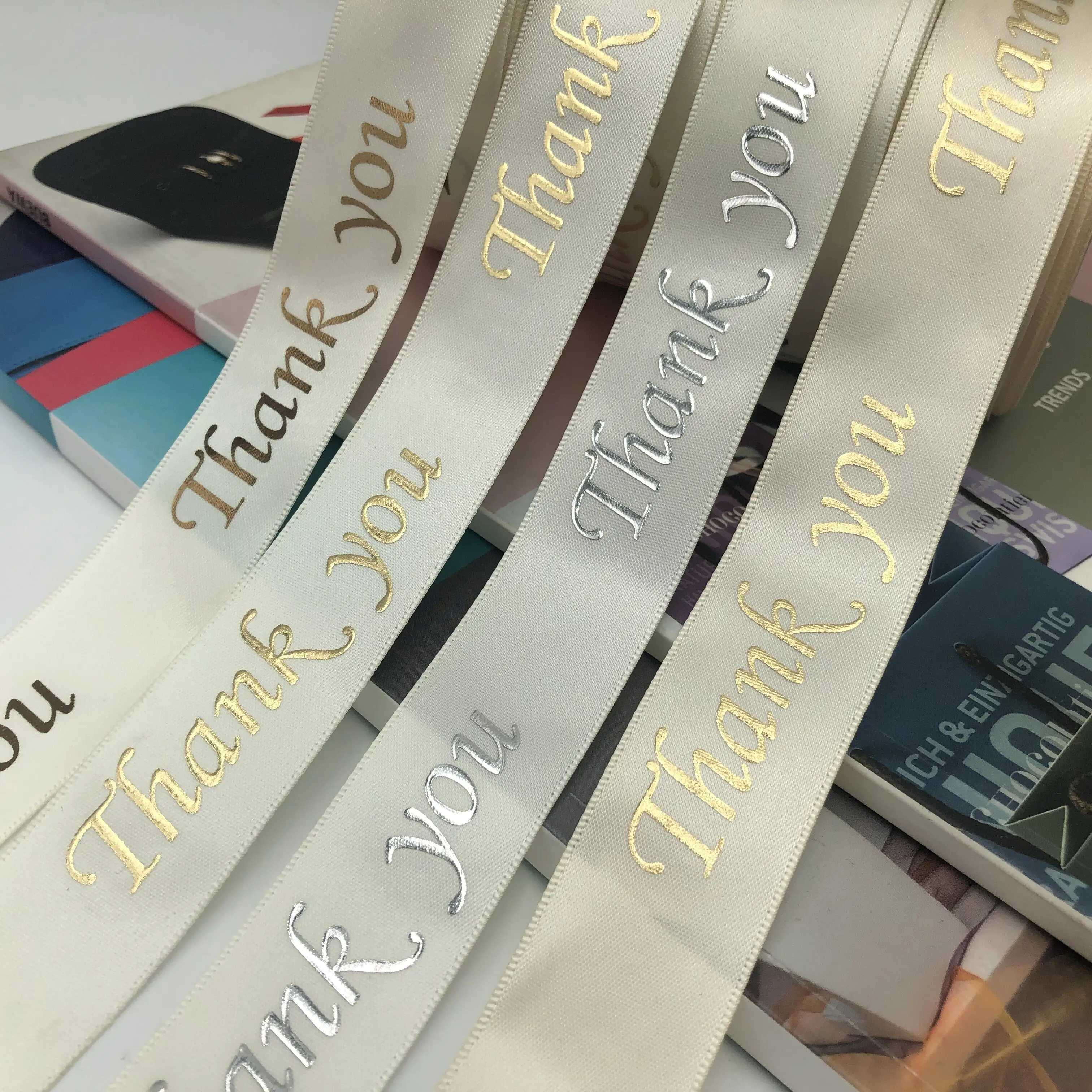 Gordon Ribbons Custom Gold Foil 3D Embossed Printed Gift Polyester Satin Ribbon With Logo Gift Packaging Ribbon