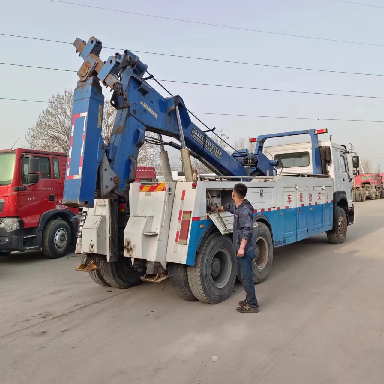 Used HOWO 40 ton under lift heavy duty rotator wrecker tow truck for sale