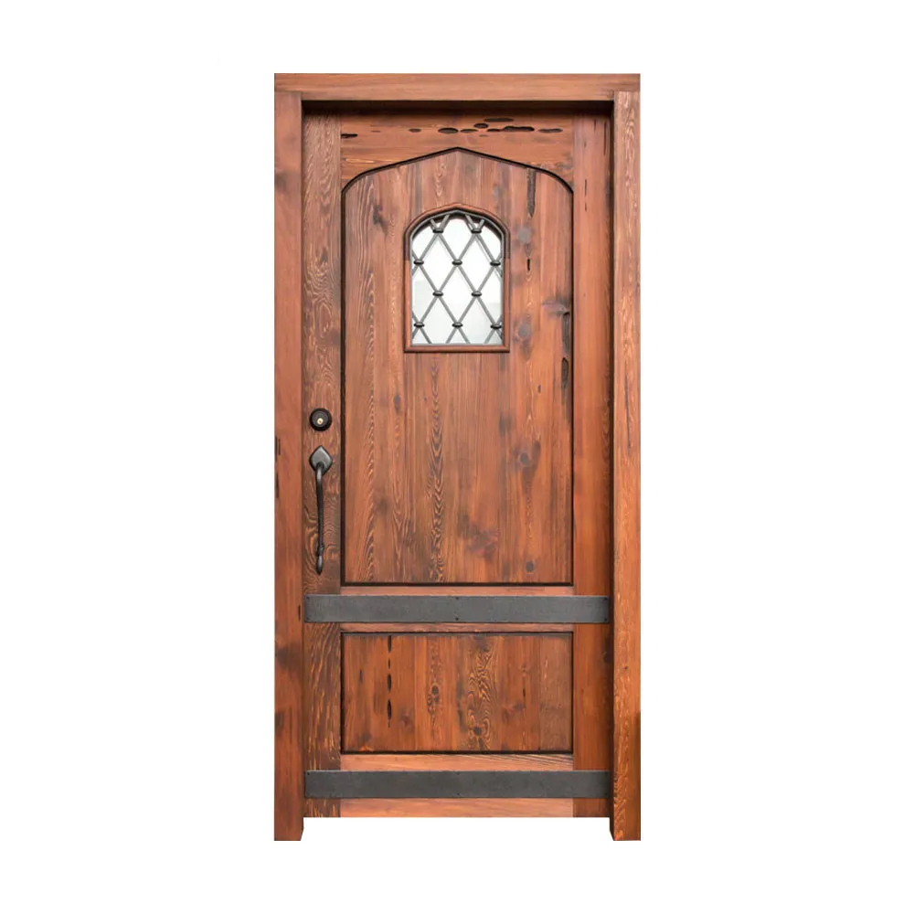 Traditional old castle wood door with wrought iron grill and clavos