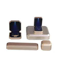 Led light ring box custom logo silkscreen printing gold plastic piano lacquer led jewelry box luxury pendant box