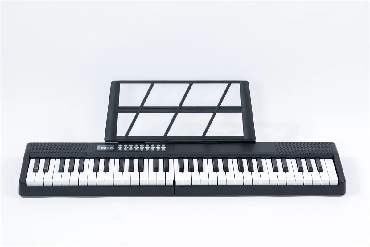 Best selling 61 keys foldable piano electronic keyboard in pink color 200 rhythms folding portable digital piano with MIDI