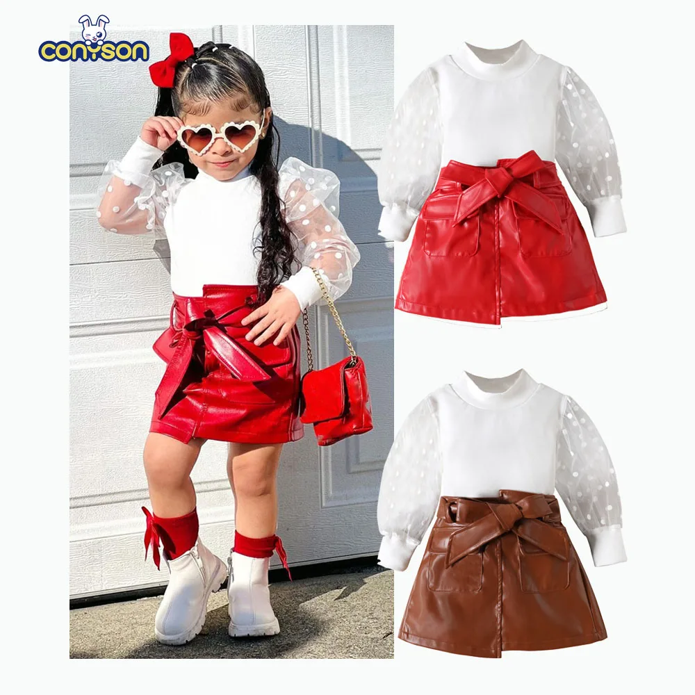 Conyson New Hot Sale Boutique Wholesale Kids Summer Solid Bubble Top Pu Leather Skirt Bow Belt Girls Two Piece Clothing Baby Set