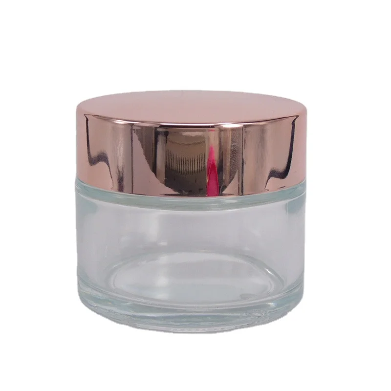 
cosmetic cream clear glass 50ml jar with silver gold and rose gold covers 