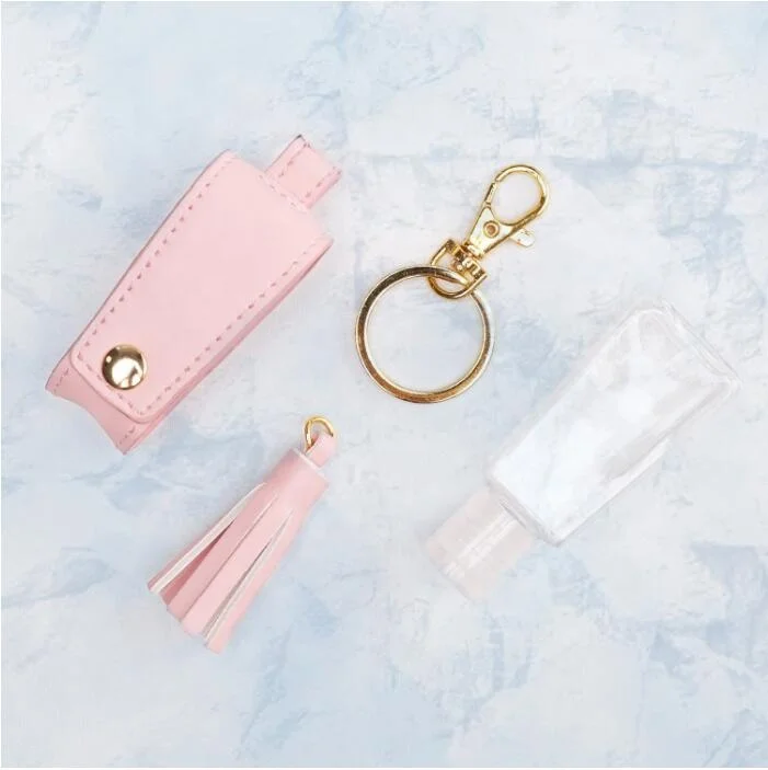 
2020 Hot Product Portable Leather and Tassels Collocation Custom Gel Hand Sanitizer Keychain Holder 