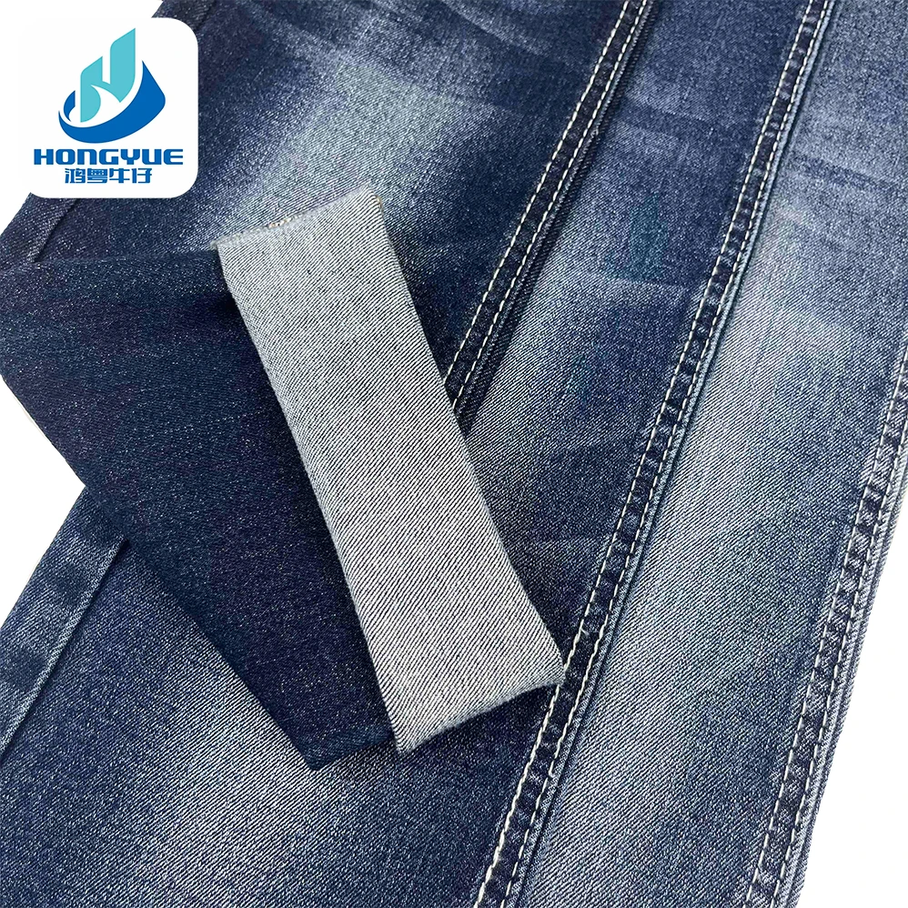 Soft Comfortable Twill Stretch Denim Jeans Fabric With Custom Design Slub Raw Denim Fabric Manufacturers In China