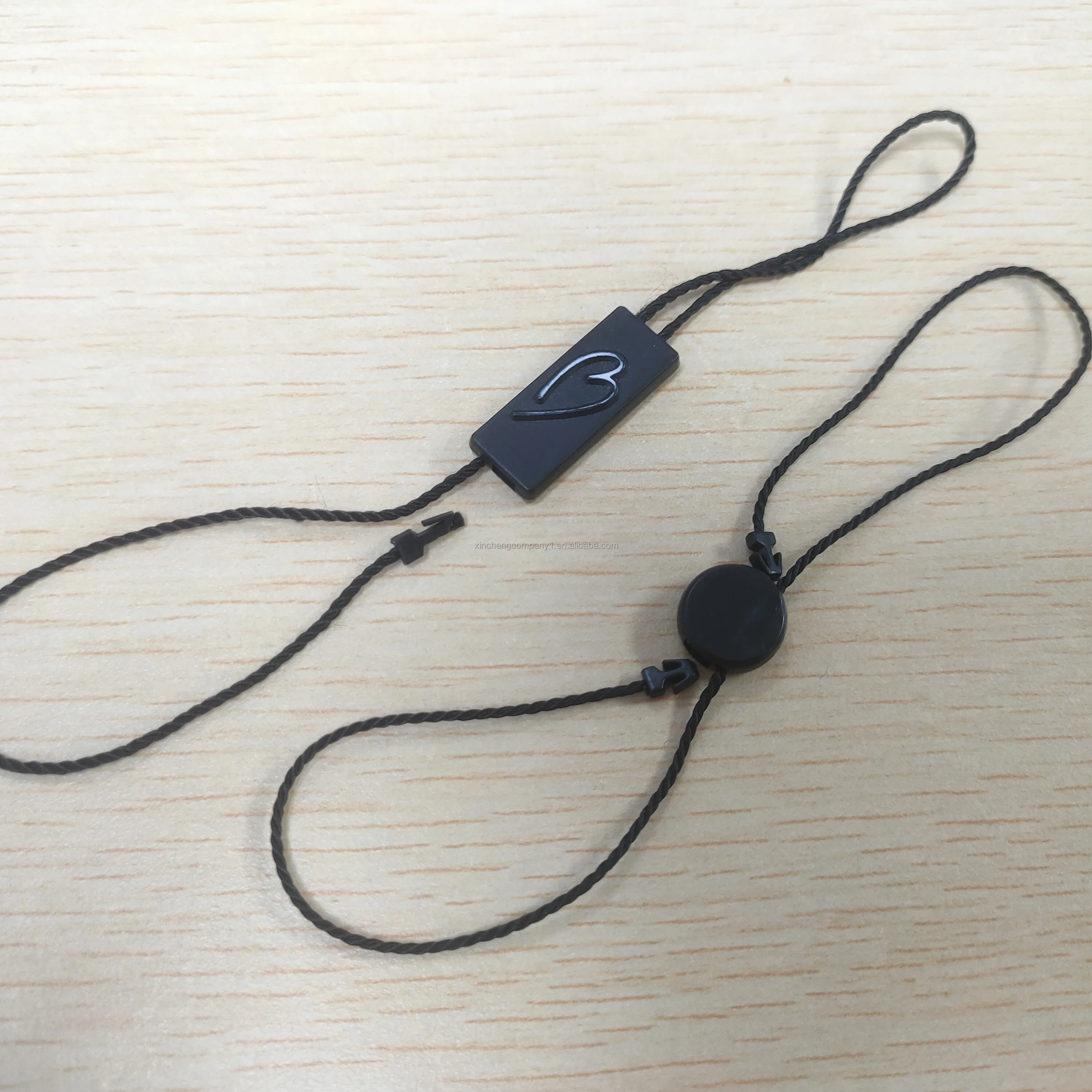 Custom Embossed Logo String Lock Plastic Hang Labels Watch String Seal Tag with Nylon String
