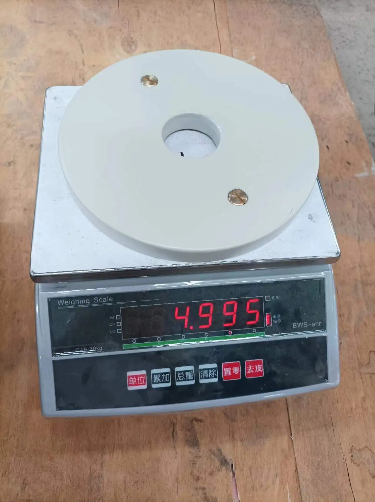 Calibrated steel power lifting barbell weight plates