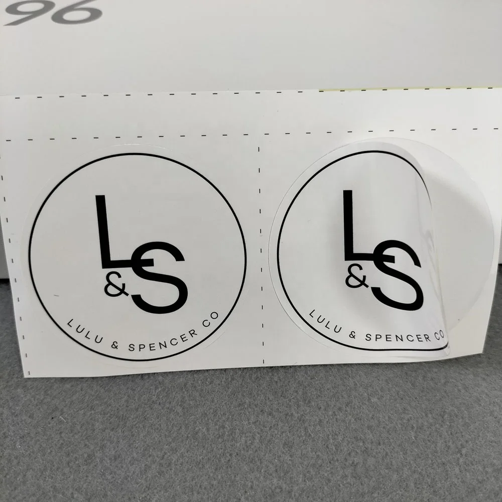 Wholesaler fashion design waterproof paper stickers garment label transparent stickers roll with your own logo