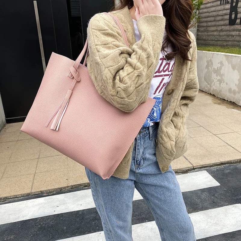 2021 New Arrival Fashion Trend One Shoulder Handbag Pure Color Tassel Clutch Tote Bag For Women