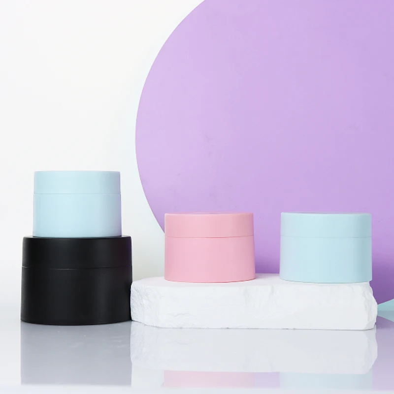New design empty refillable 10ml 30ml 50ml white black pink blue plastic small face cream jar for cosmetic