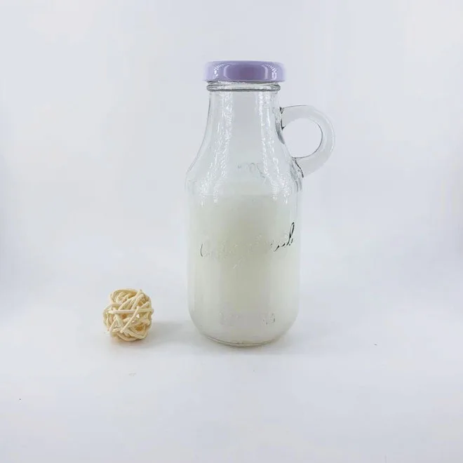 250ml clear vintage embossed glass milk juice bottle with small handle and scale line