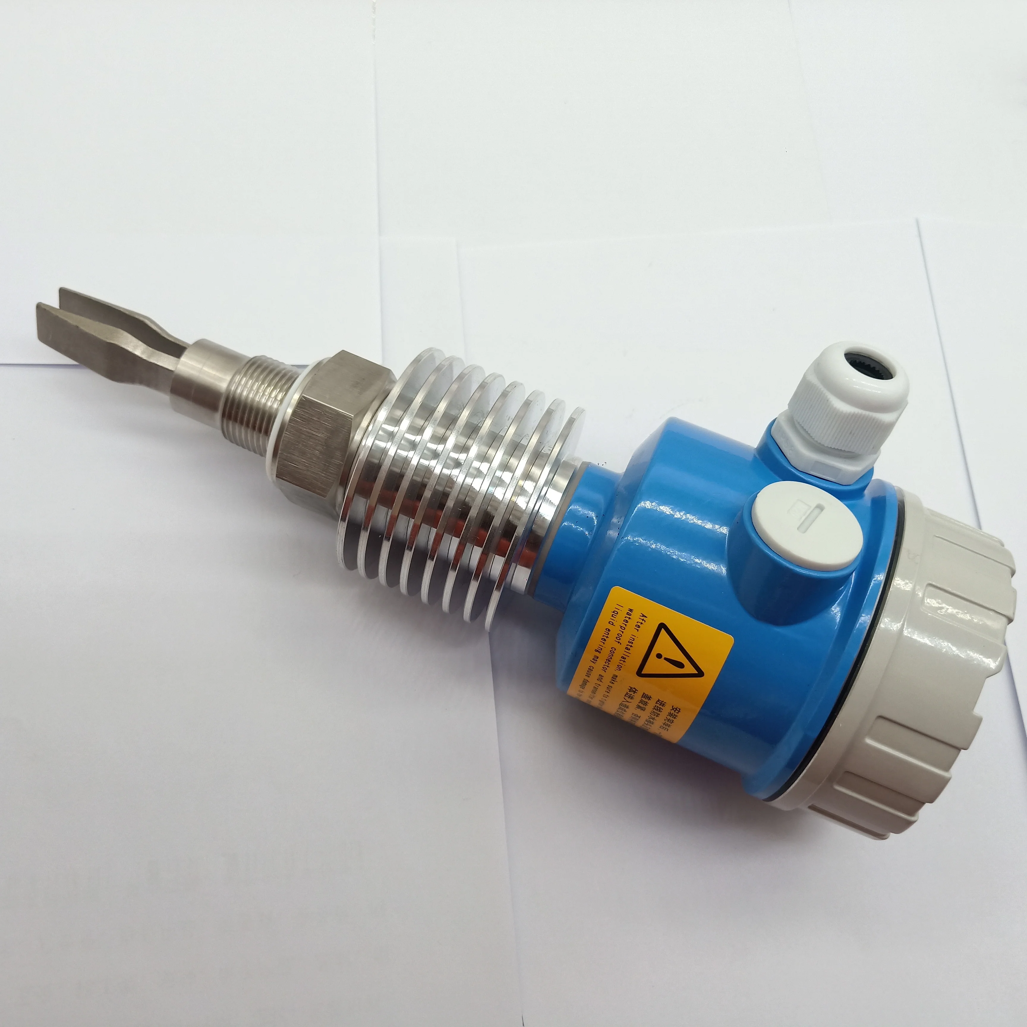 Tuning fork level switch for solid vibrating rod level switch