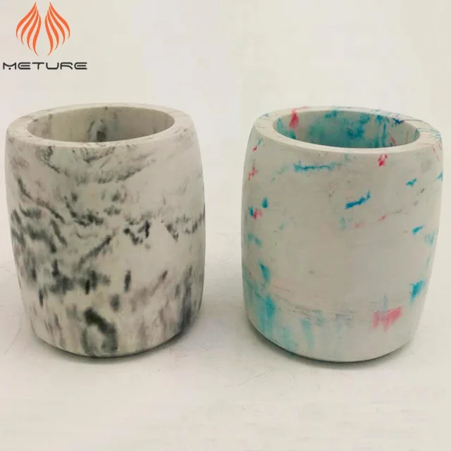 Square concrete candle vessels with marble style surface