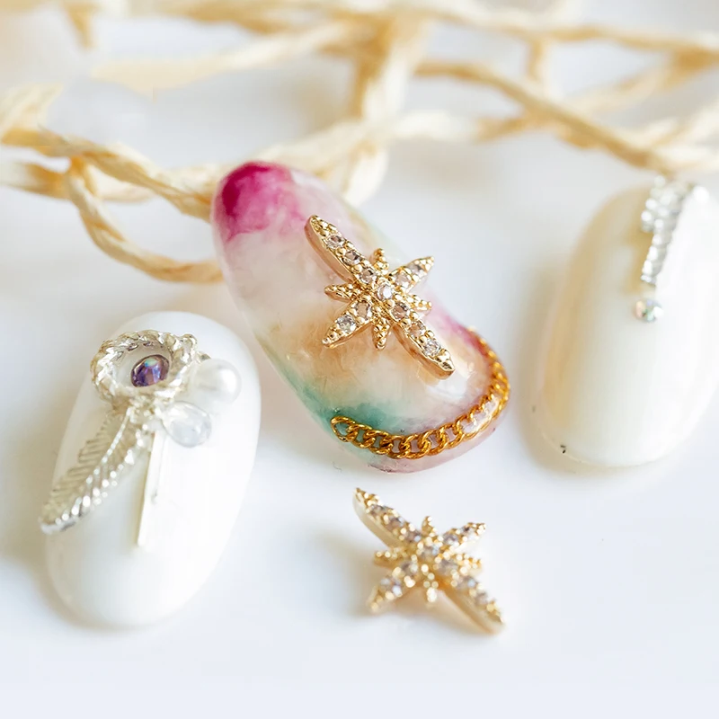 
2021 New Plum Tassel Cross Wholesale Crystal Nail Art Decoration Nail Rhinestone 