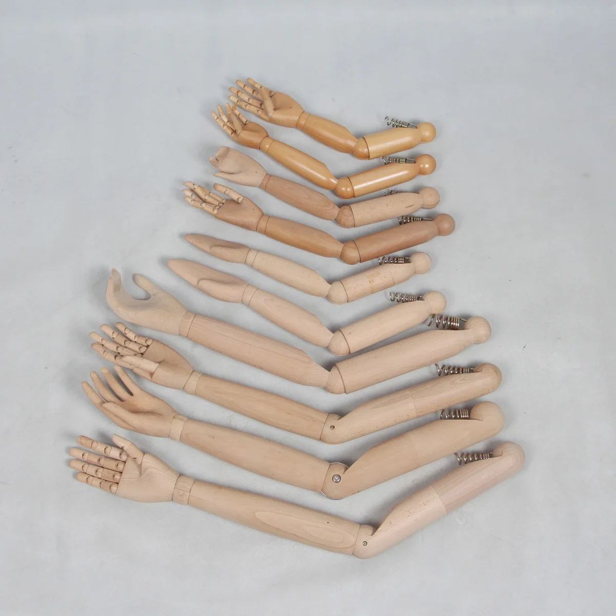 Mannequins and tailor bust form wooden articulated arms with hands
