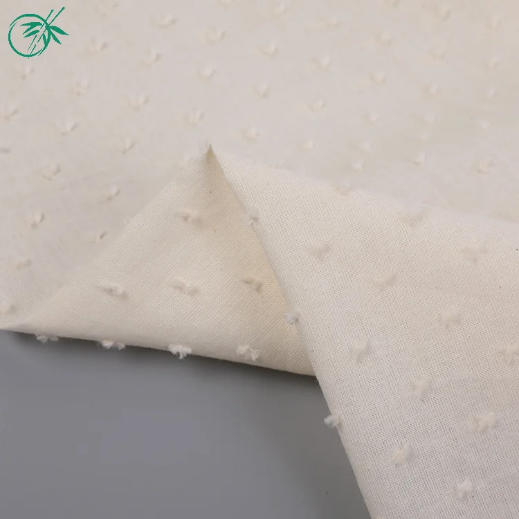 Wholesale manufacturer stocklot cutting motif textiles 100% cotton fabric china