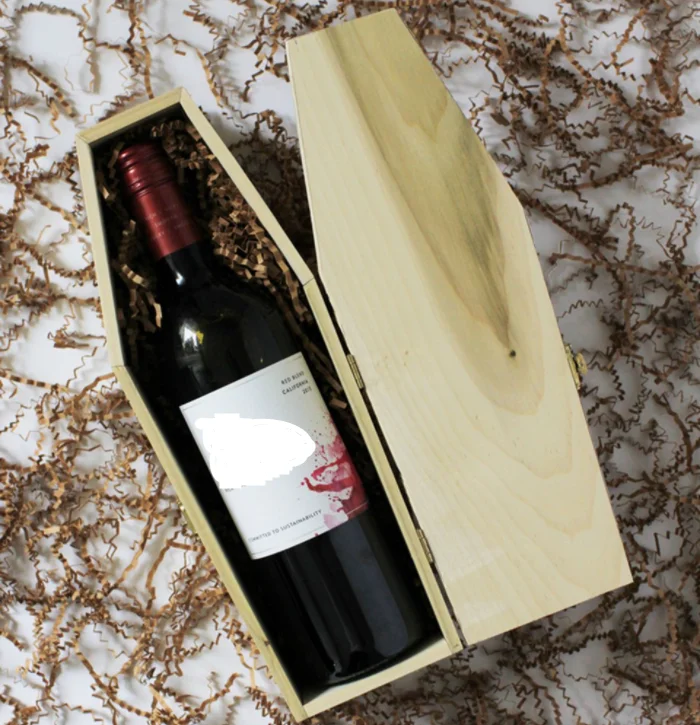 DIY a small wood coffin black ribbon and a gift tag that hints at the coffins contents Wine Bottle Coffin