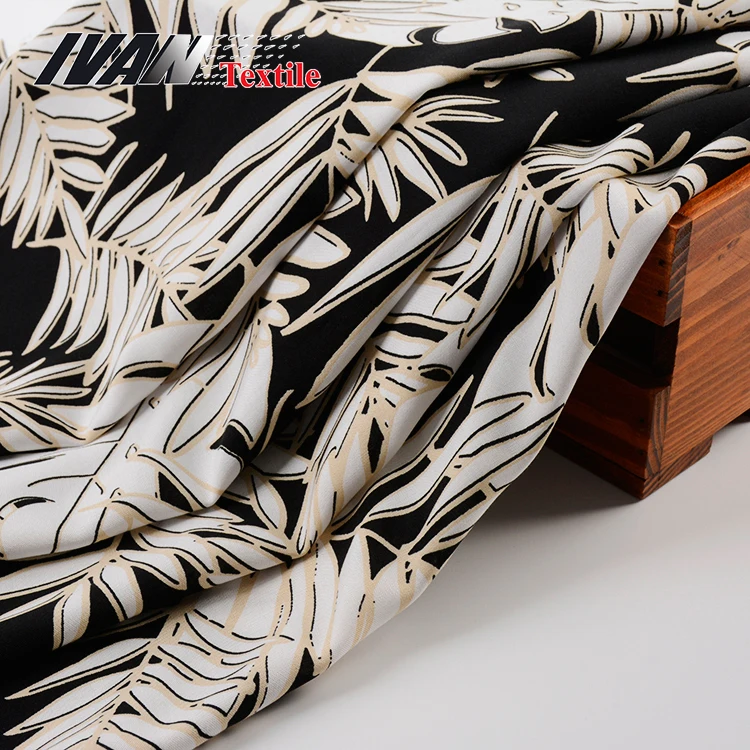 
New fashion printing wholesale black leaves woven plain rayon fabric for dress 