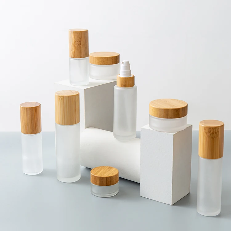 Hot sale cosmetic packaging 30ml 50ml 100ml 120ml frosted glass bottle with bamboo lid
