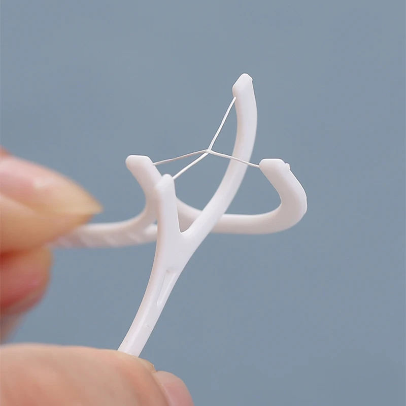 high quality low price teeth cleaner 100pcs per bag portable dental floss plastic toothpick with long handle