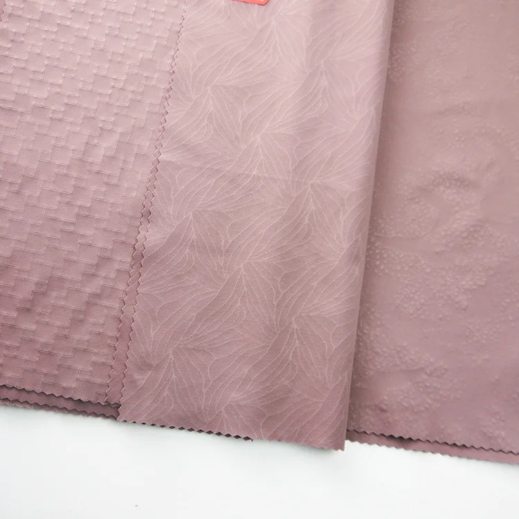 Factory cheap price nylon spandex embossed fabric naked feeling Yoga sweat suit high elastic jacquard pit pleated fabric