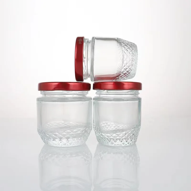 Wholesale 50ml 75ml 100ml Small Glass Jam Jar with Metal Lug for Caviar Honey Spice