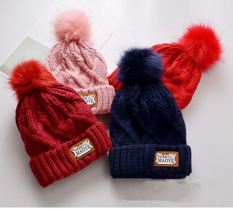 
Wholesale Winter Unisex Winter Blank Knitted Leather Label High Quality Pom Pom Beanie Hat 