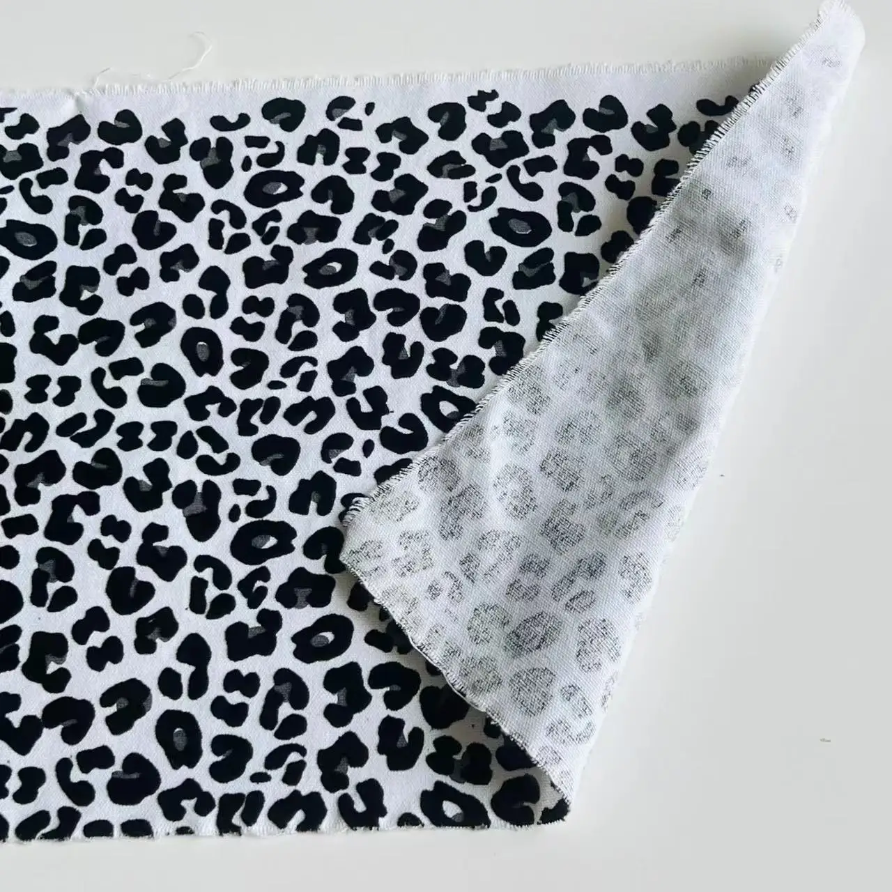 Fashionable leopard pattern flocked cotton canvas fabric for canvas bag drawstring bag