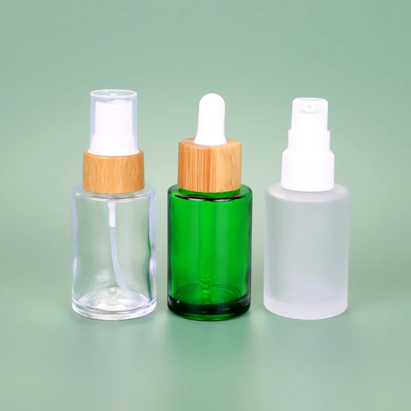 
Factory Custom Gold Cap Green Clear 100ml Glass Dropper Bottle Glass Lotion Pump Bottle 