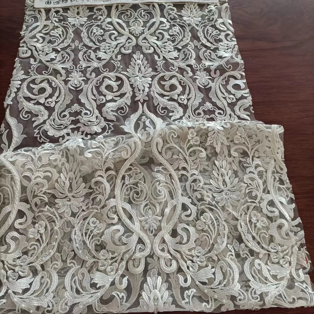 The most popular white sequined crystal sequined lace fabric bead lace, bridal gown evening dress