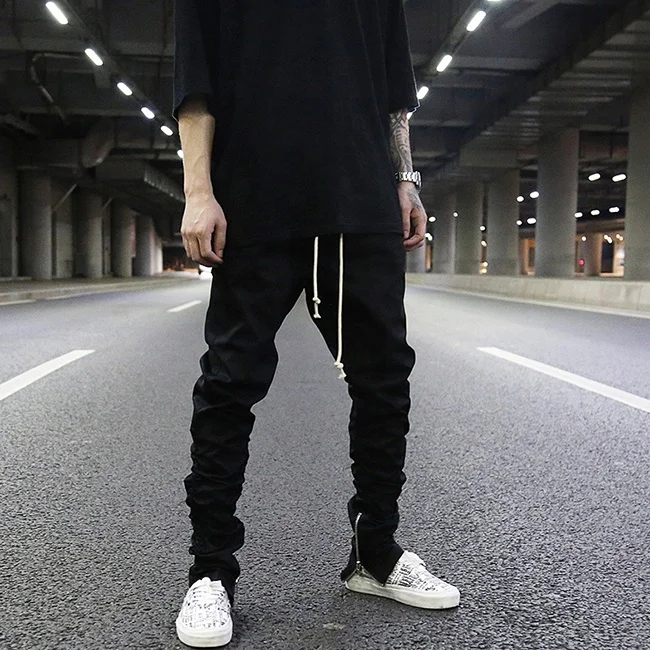 OEM fog trendy plain color draped stretch waist pants men stock slim fit ankle zipper jogger pants teen punk rap streetwear
