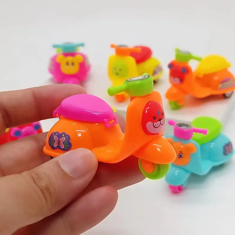 hot selling giveaway kids cars factories mini motorcycle toys with plastic capsule for kids cars