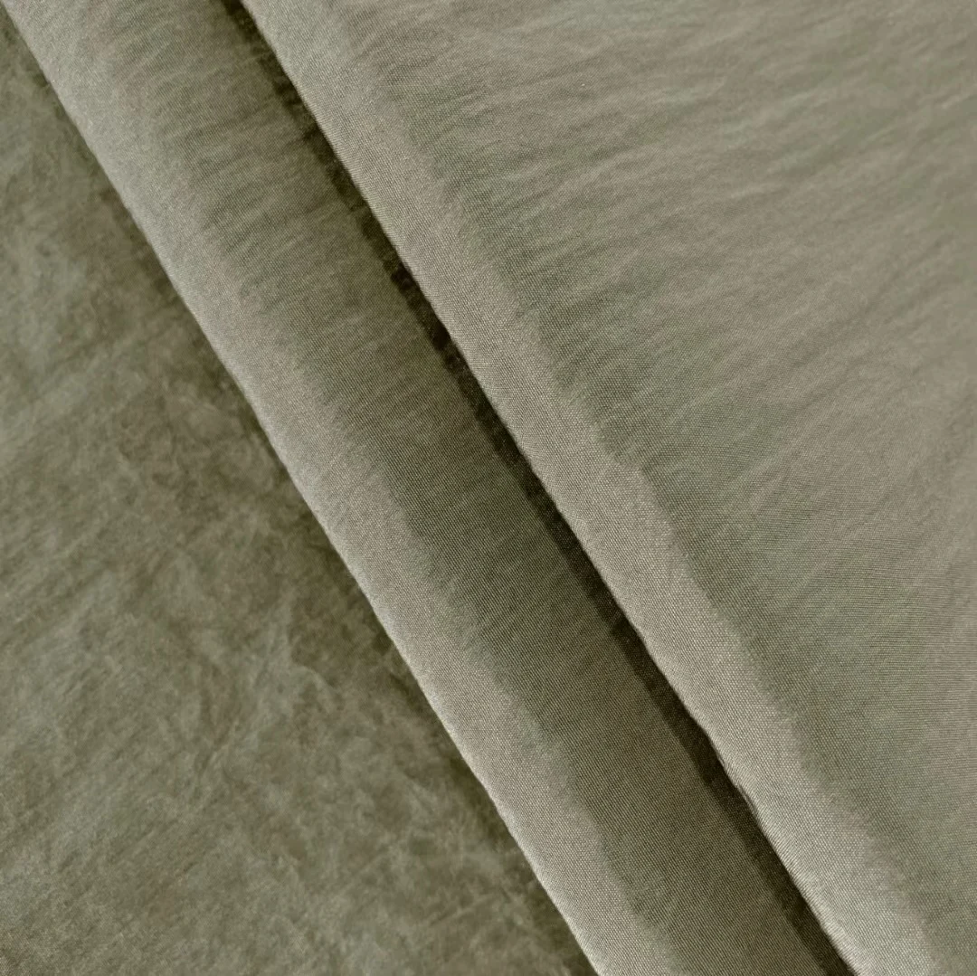 New design soft shiny wrinkle style 108gsm lightweight fabric for jackets