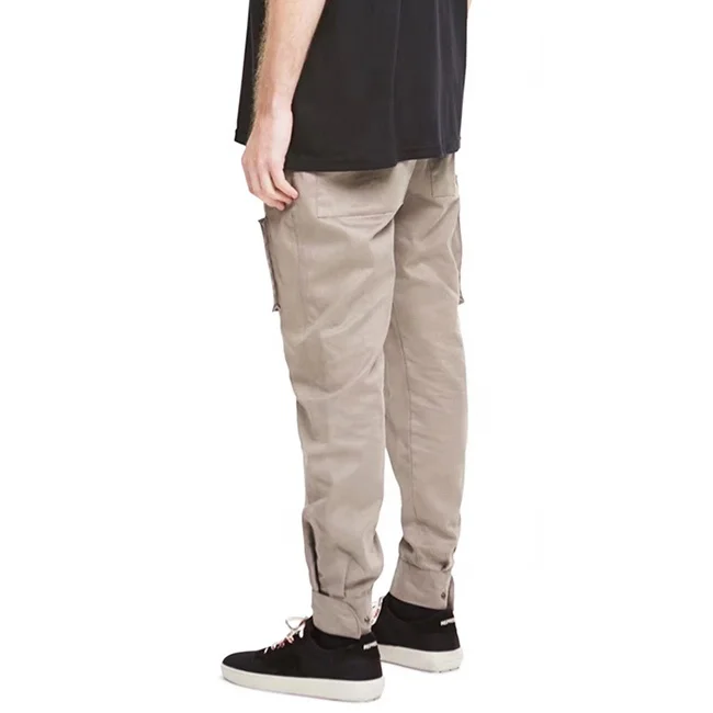 
Low moq street multi zipper pockets pencil pants solid color elastic drawstring jogger pants popular casual cargo pants stock 