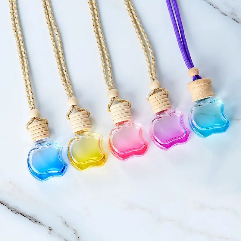 Hot selling colour 10ml car use perfume bottle mini pendant glass bottle aromatherapy bottles with wooden cover