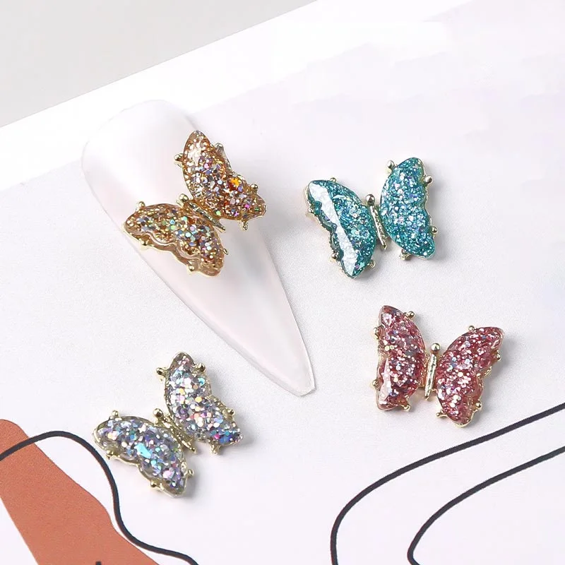 Factory Price Aurora Colorful Butterfly Nail Rhinestones 3D Metal Alloy Silver Bows Nail Art Charm Decoration Supplies