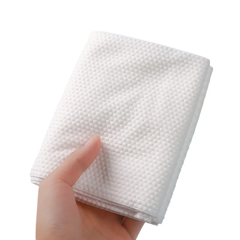 Compressed bath towel thickened and increased disposable portable individually packaged non-woven 70x140