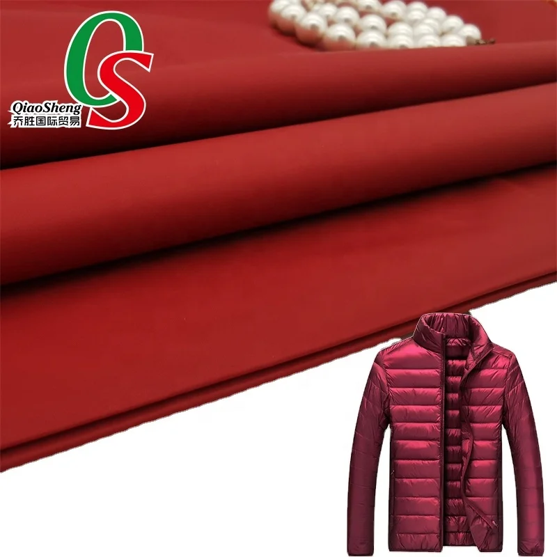 100%nylon downproof windproof water Repellent plain taffeta heavy cire oil calender fabric for down jacket warm cloth