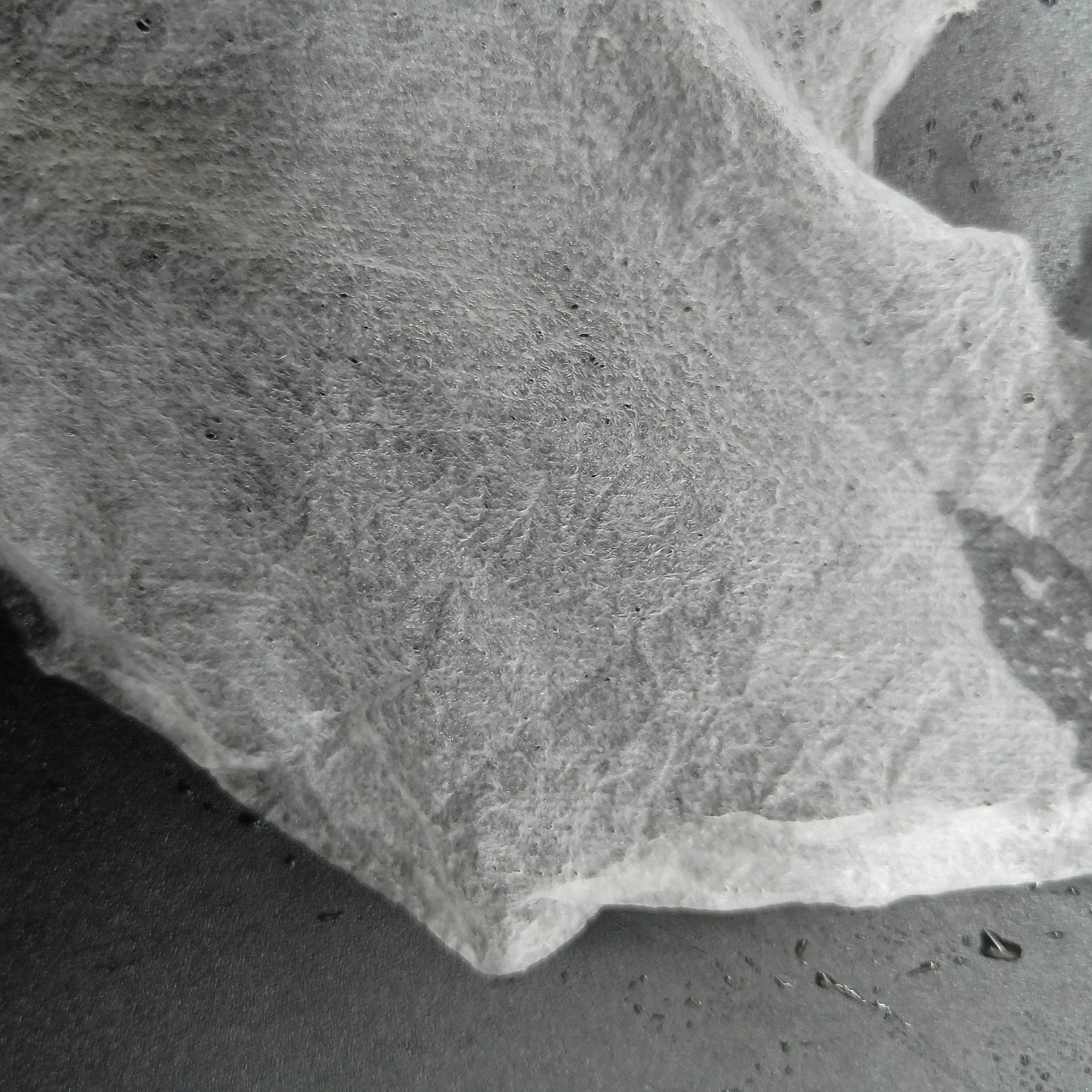 Compressed Facial Mask Cupro Spunlace Nonwoven Fabric Lyocell Dry Facial Mask Sheet Compressed Non woven Fabric Manufacturer