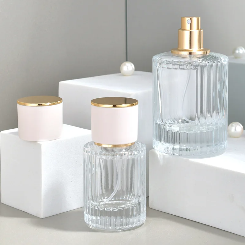 Custom Logo Luxury Glass Spray Bottle 30ml 50ml Cylindrical Shape Clear Crimp Perfume Bottle