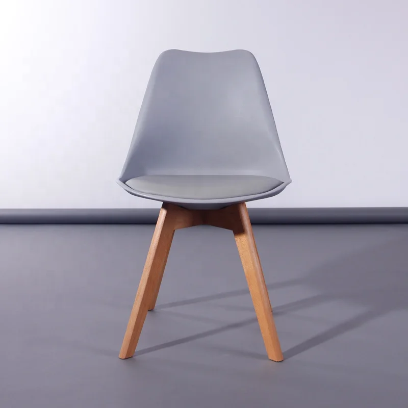 
Wholesale dining room furniture plastic chairs PU cushion wooden legs black color dining chair 