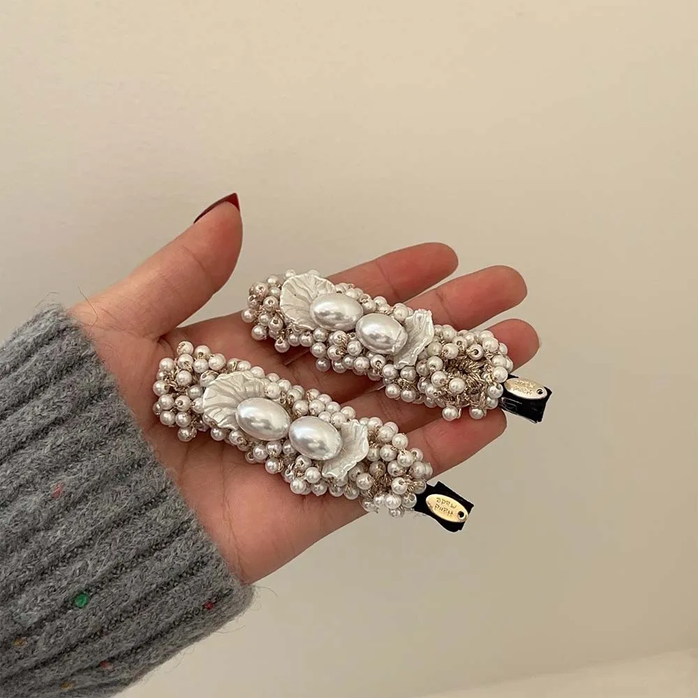 ins hot selling korean girls alligator hair clips pearl duck bill bow flower hair clips women accessories wholesale